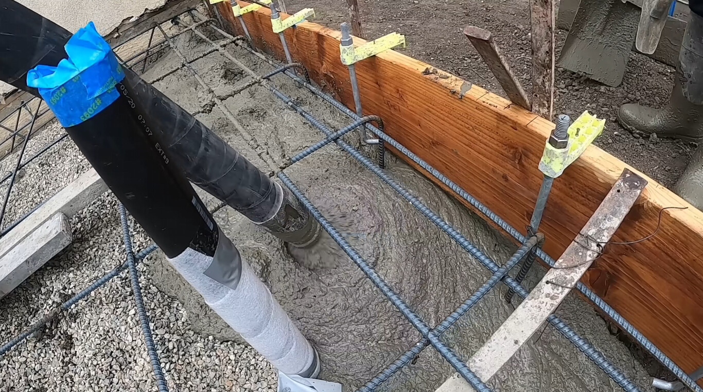 Solid concrete foundation work with rebar reinforcement